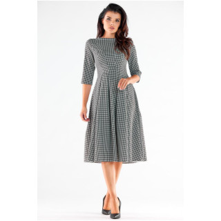 Női, kiszélesedő, fekete-fehér ruha, mintával